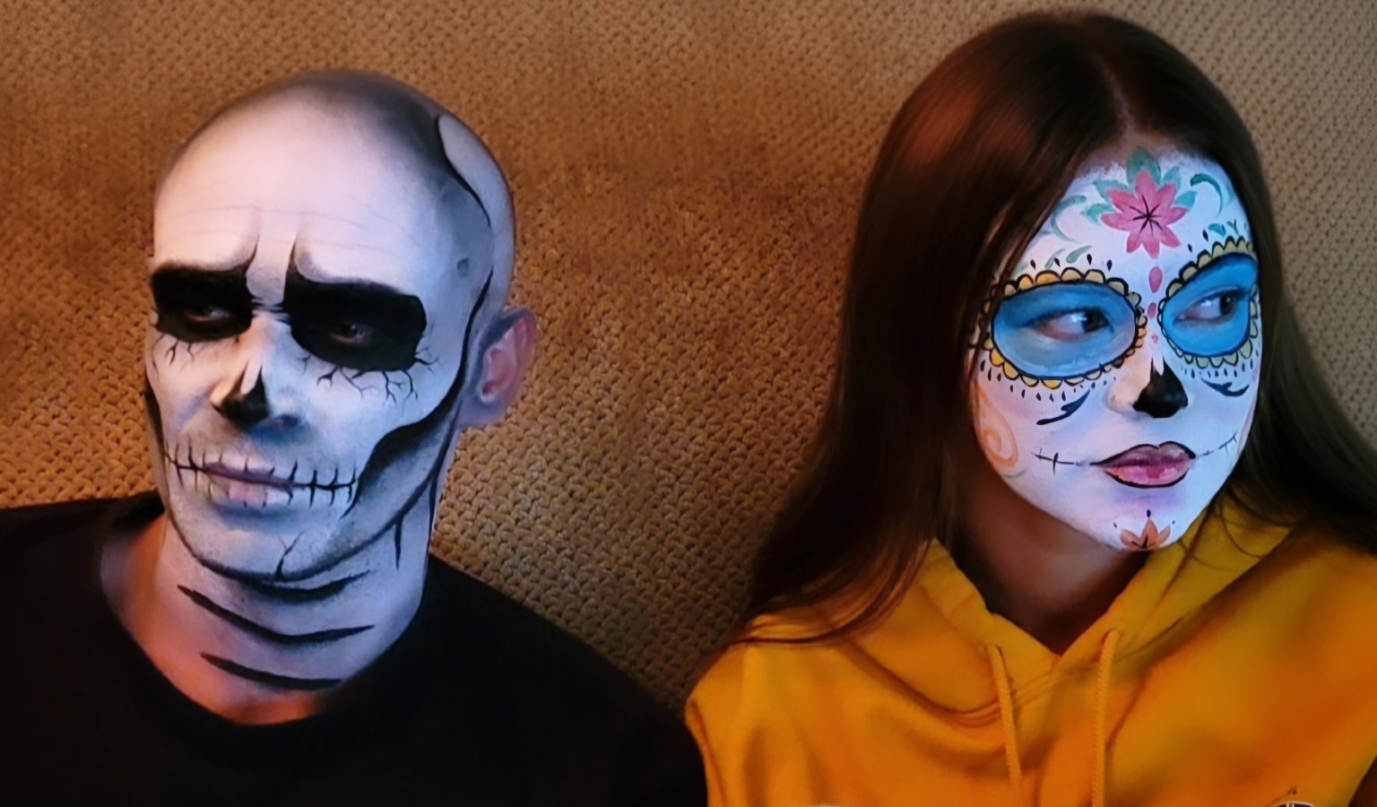 Skull and colorful sugar skull face painting